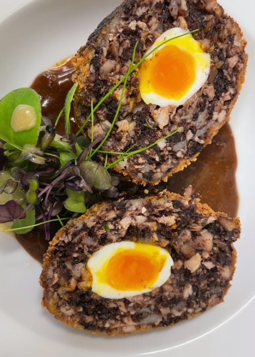 Fennel & Clove Catering - Cumbria and southern scotland - black pudding scotch quail egg with devilled tomato sauce and microsalad
